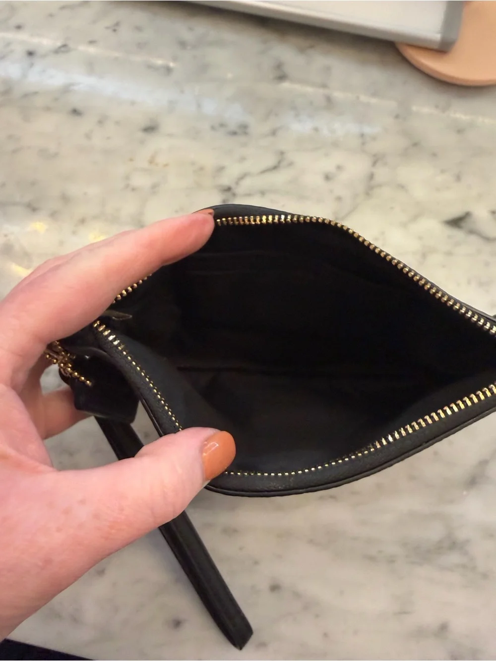 COACH Black Floral Zip Wristlet with Gold Logo